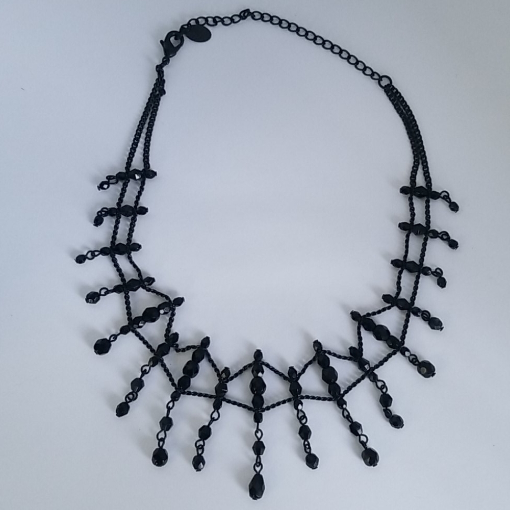 Black beaded choker and earring set.
